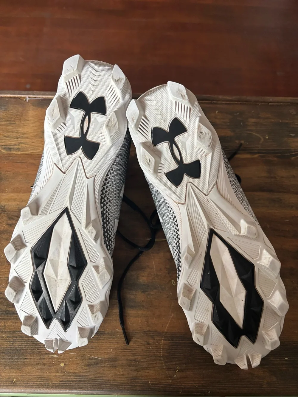 Under Armour Men’s Black and White Athletic Cleats